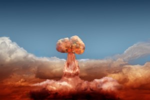 explosion of atomic bomb on background of sky